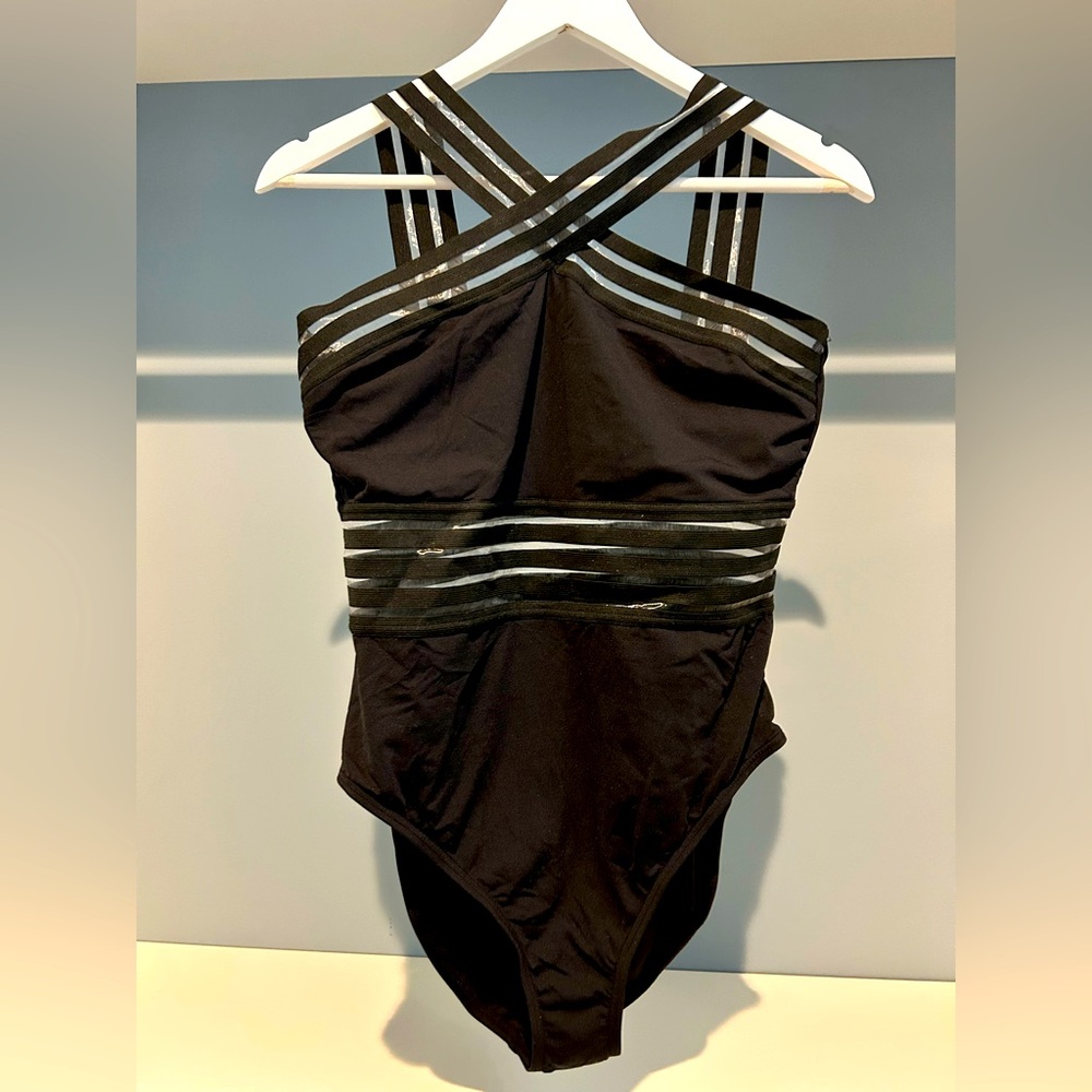 Kenneth Cole New York Black One Piece Swimsuit.Mesh detailing. Sz large. Pretty!